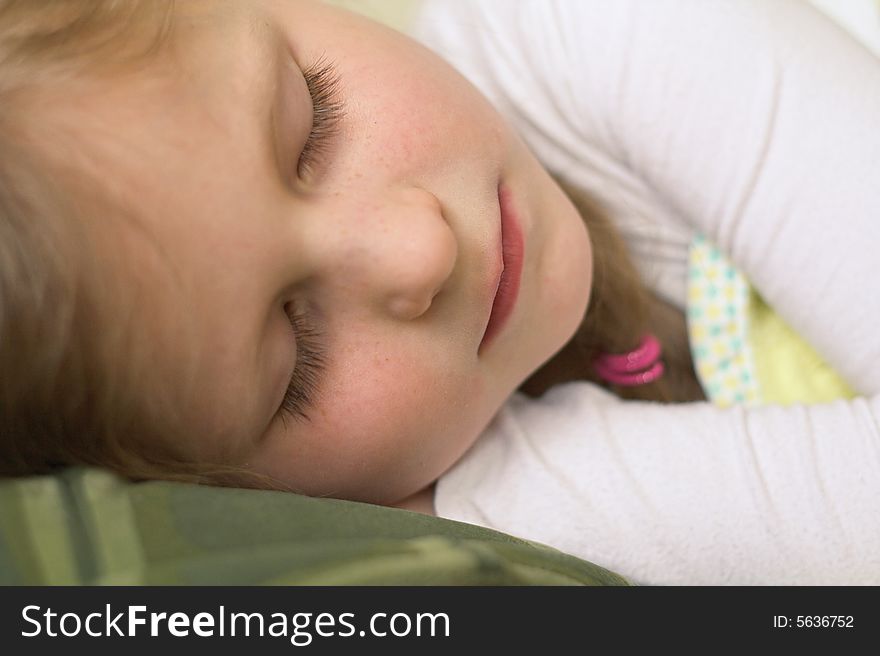 Sleeping young girl in white blouse. Sleeping young girl in white blouse