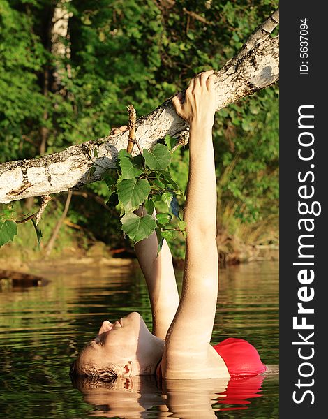 Woman under Tree in Water