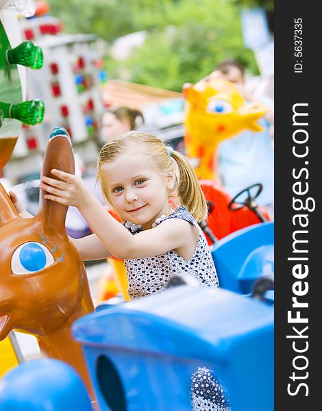 little cute girl having fun in park