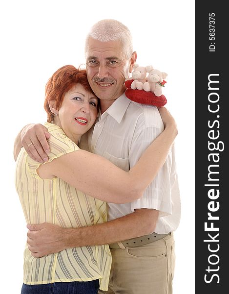 Seniou couple with toy in studio on white background. Seniou couple with toy in studio on white background