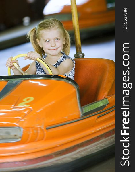 Little cute girl having fun in park