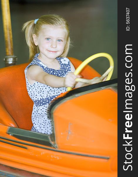 Little cute girl having fun in park