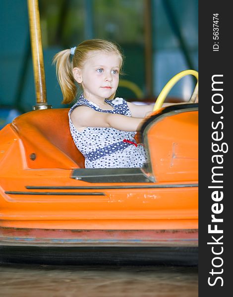 Little cute girl having fun in park