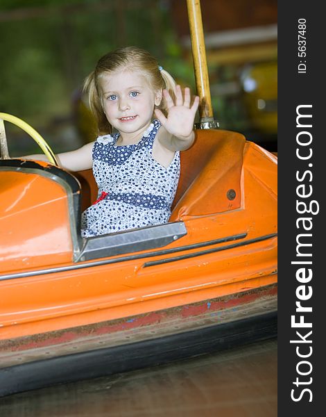 Little cute girl having fun in park