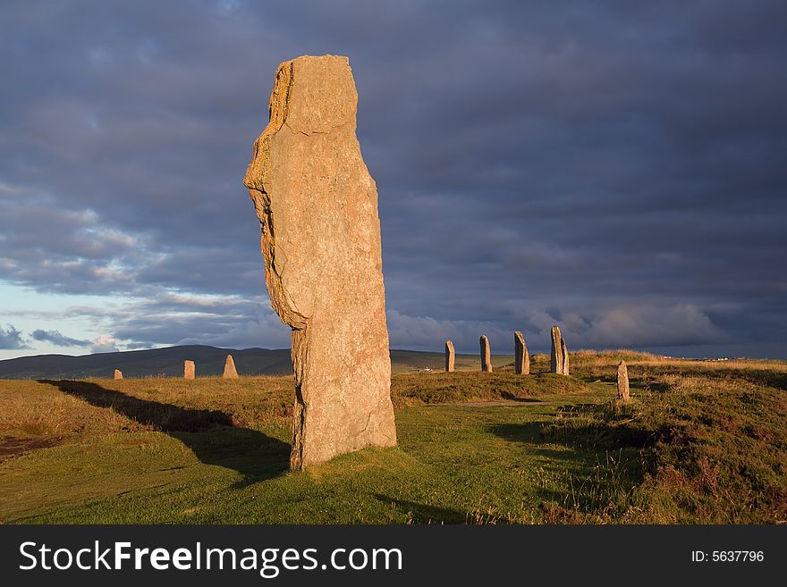 Ring of Brodgar in dramatic evening light and cloudscape. Ring of Brodgar in dramatic evening light and cloudscape