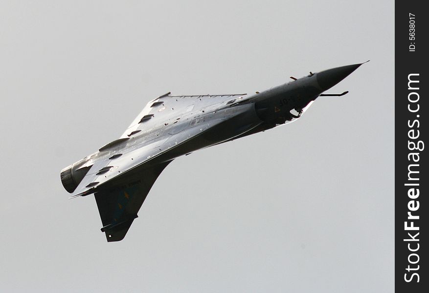 This is a photo from the flying show from the French Fir Force, on the open day in Leeuwarden Airbase. The aircraft is Mirage 2000. This is a photo from the flying show from the French Fir Force, on the open day in Leeuwarden Airbase. The aircraft is Mirage 2000