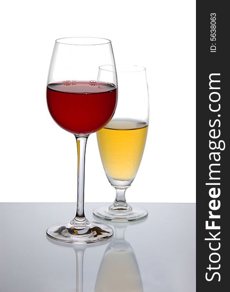 Two glasses of wine on white background