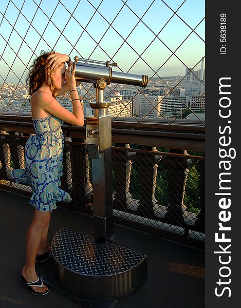 Woman enjoying view on Eiffel tower