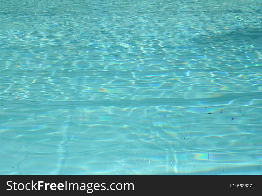 Swimming pool with reflection of the sun in the water. Swimming pool with reflection of the sun in the water