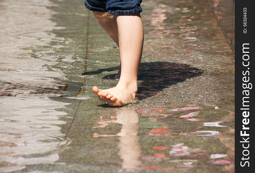 Boy S Feet Playing The Fountain