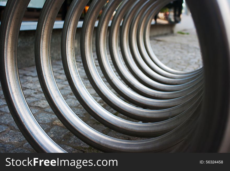 Large metal spiral as an abstract background with perspective outside