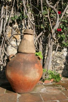 Pottery In Mexican Courtyard Stock Photo