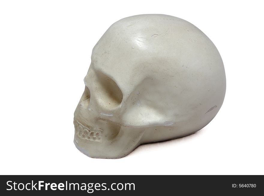 Plaster skull isolated over white. Plaster skull isolated over white