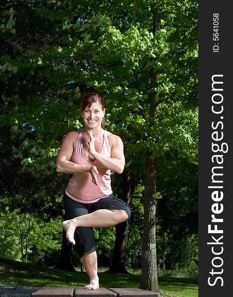 Woman Standing On Picnic Table - Vertical