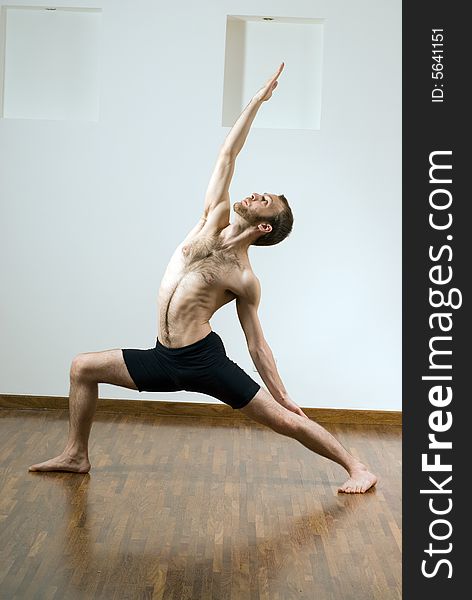 Man in a Yoga Pose - Vertical