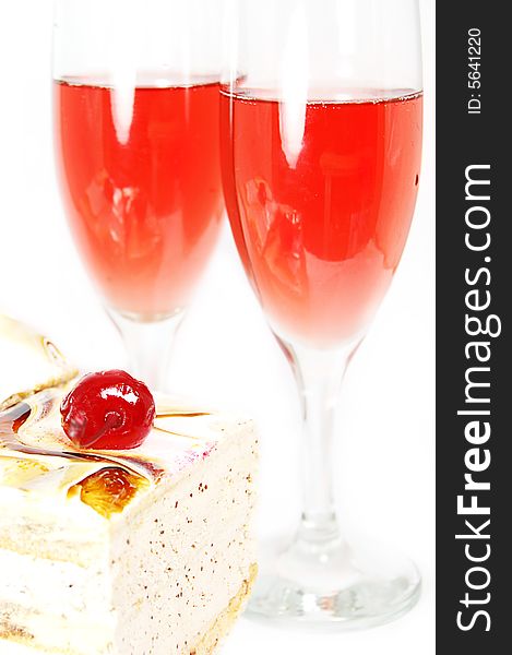 Red wine and cake with cherry in white. Red wine and cake with cherry in white