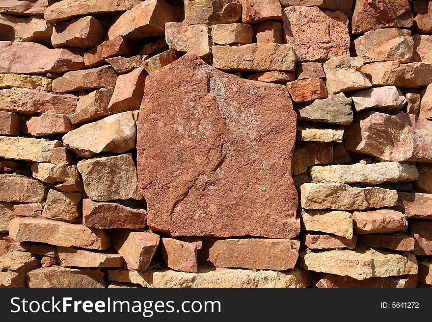 Wall of rock stones background