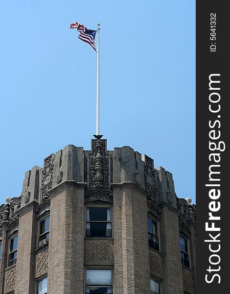 Historic professional building in the beautiful coastal city of Monterey, California, USA; American flag. Historic professional building in the beautiful coastal city of Monterey, California, USA; American flag