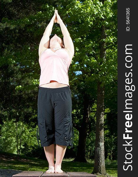 Woman Standing on Picnic Table - Vertical