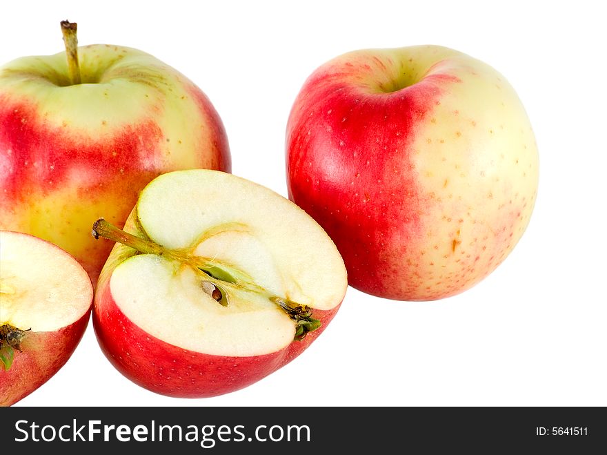 Three red-yellow apples on a white background. Three red-yellow apples on a white background