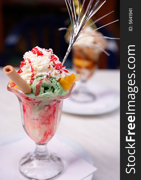 A photo of multi color icecream in cafe