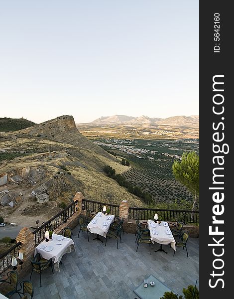 Restaurant balcony with mediterranean background.