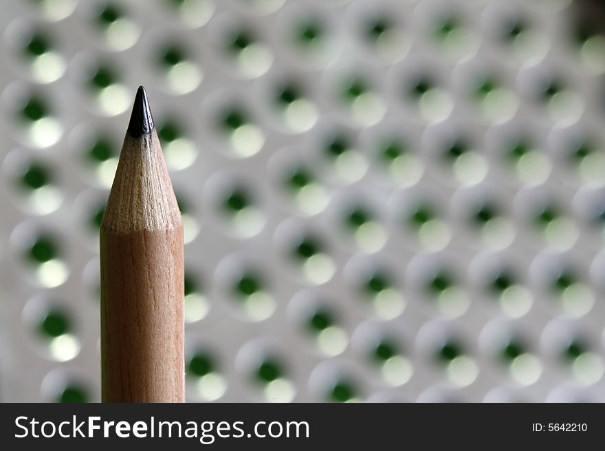 A pencil  with a simple color background. A pencil  with a simple color background