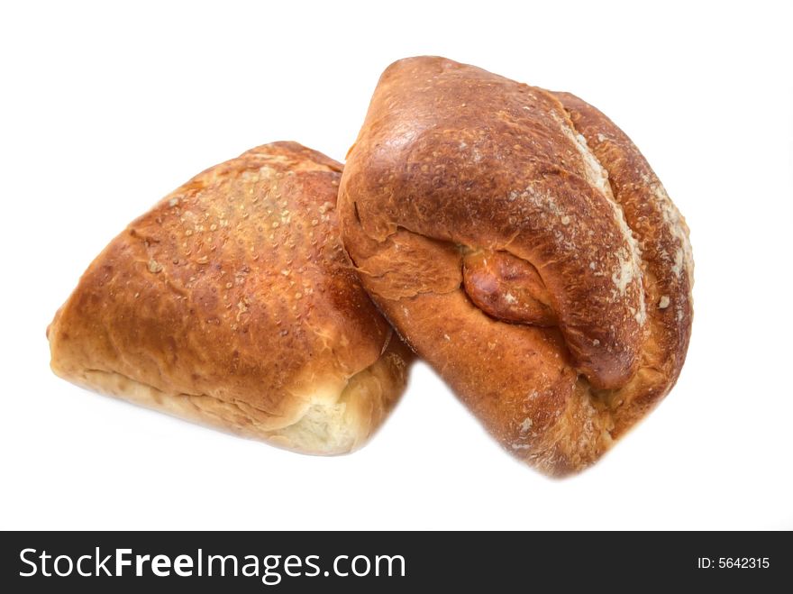 Two sweet fresh rolls isolated a white background. Two sweet fresh rolls isolated a white background