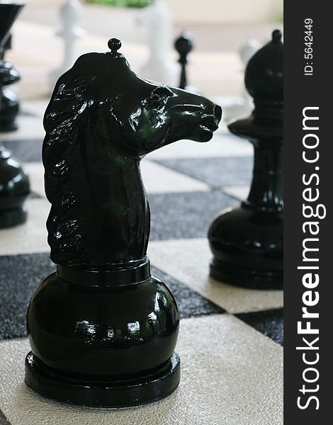 Chess pieces on a board.