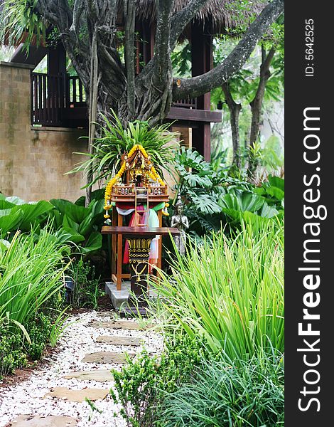 Offerings on a spirit house in Thailand - travel and tourism. Offerings on a spirit house in Thailand - travel and tourism.