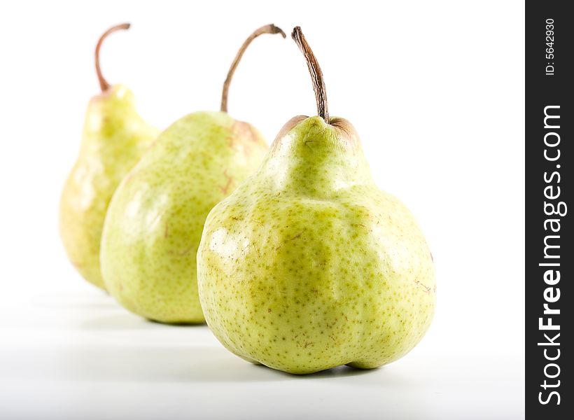 Fresh green pears isolated on a white background