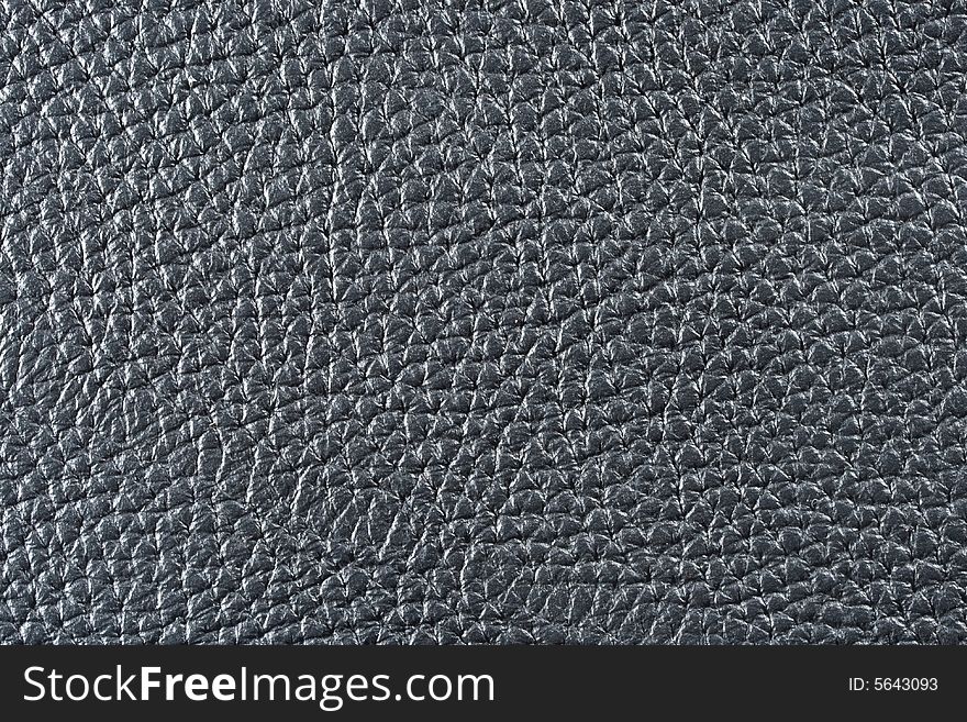 Natural qualitative black leather texture. Close up. Natural qualitative black leather texture. Close up.