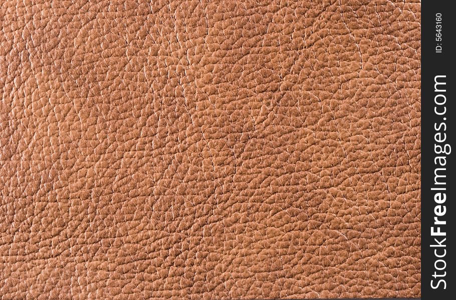 Natural qualitative brown leather texture. Close up. Natural qualitative brown leather texture. Close up.