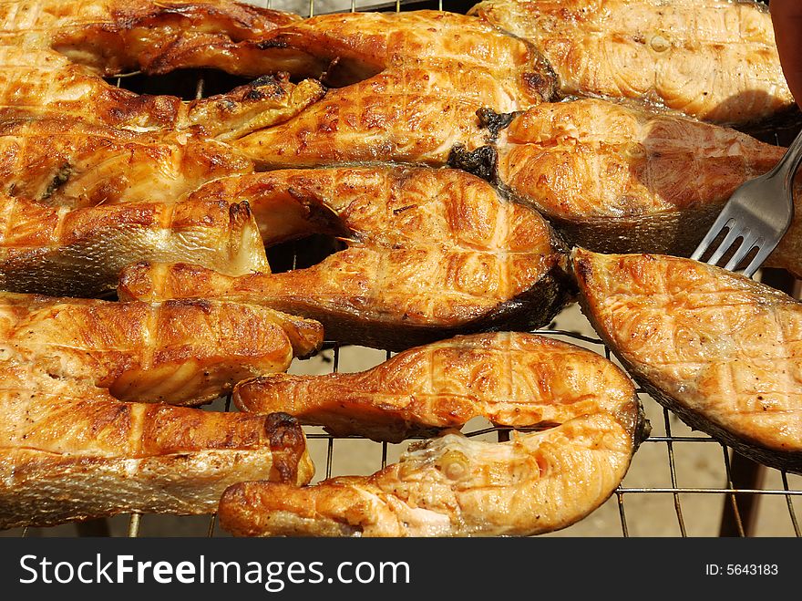 Appetizing barbecue from a red fish (Salmon and
Trout)