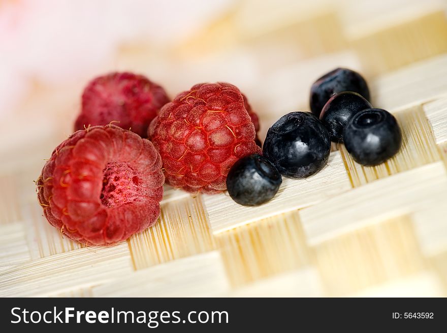 Raspberry and berry - fruits of summer. Raspberry and berry - fruits of summer