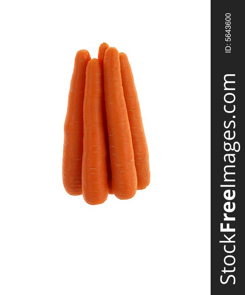 Carrots standing in the pyramid isolated on the white background
