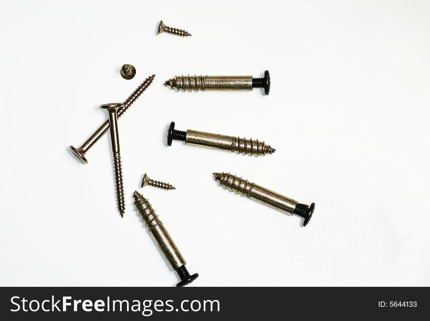 Set of golden Screws isolated on white