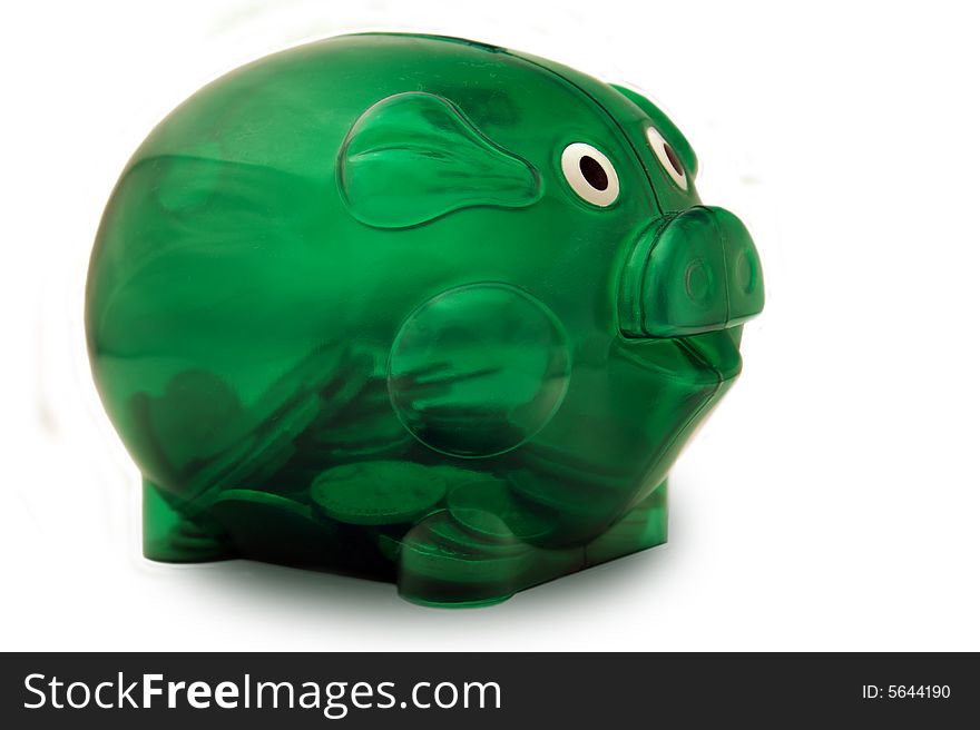 Half full piggy bank - Isolated. Half full piggy bank - Isolated