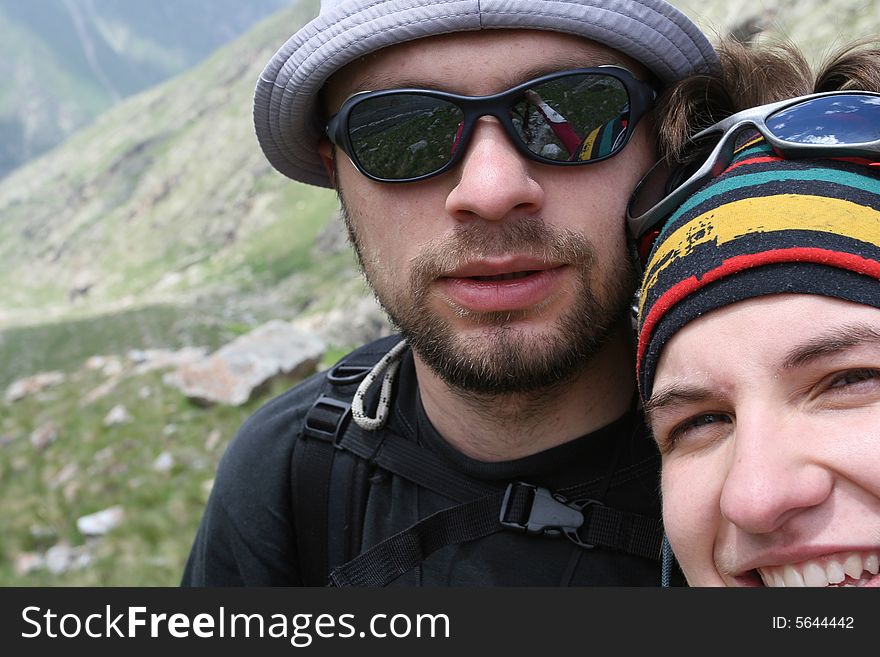 Hikers on the cliff in mountain,. Hikers on the cliff in mountain,