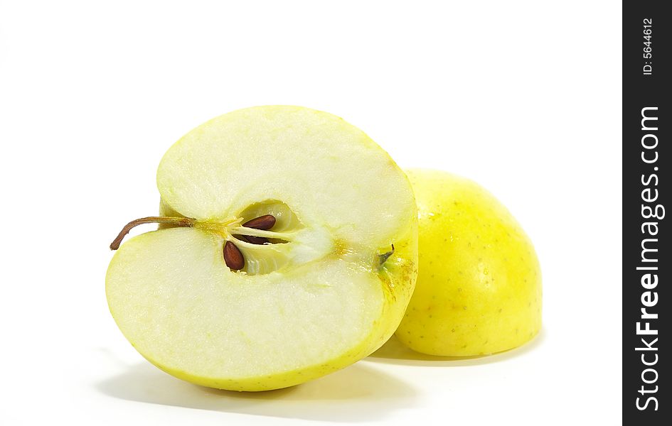 Cut freshness yellow apple isolated on white