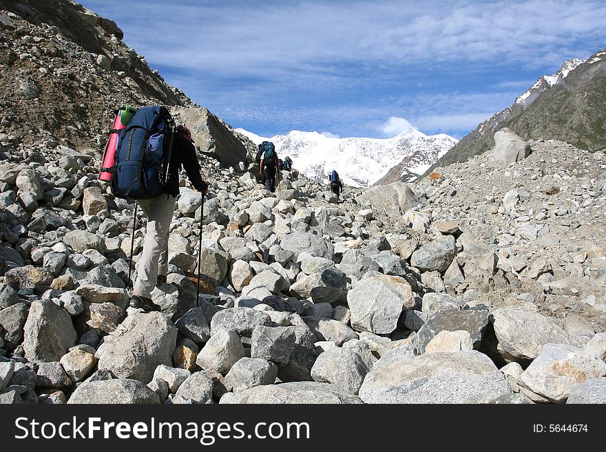 Hikers on the cliff in mountain,. Hikers on the cliff in mountain,