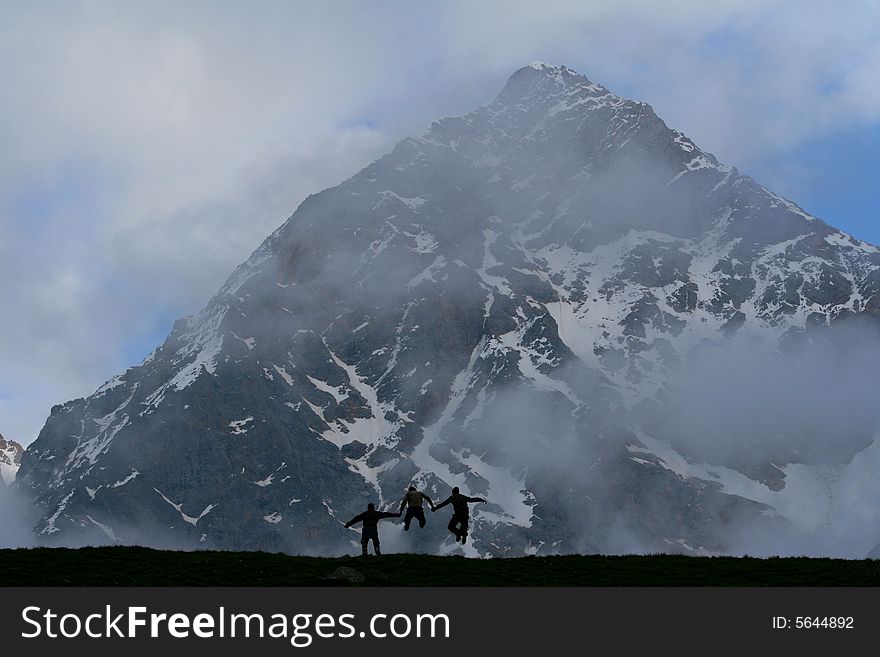 Hikers on the cliff in mountain,. Hikers on the cliff in mountain,