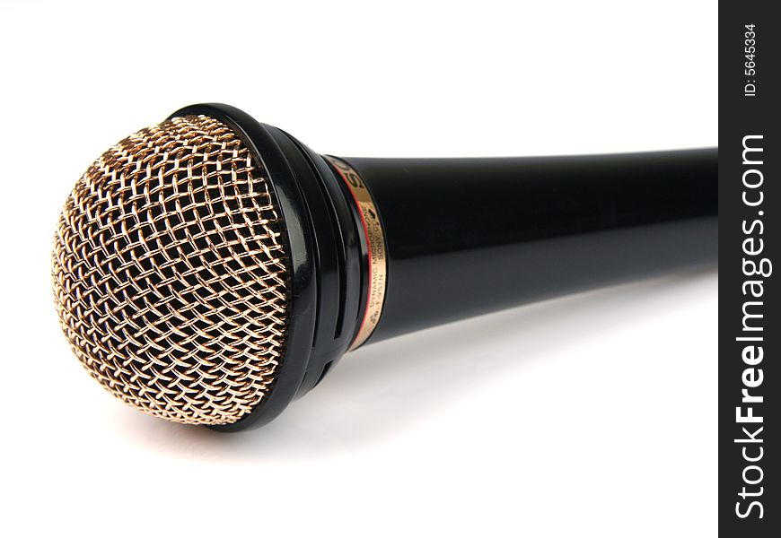 Black microphone isolated on white background
