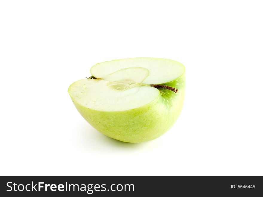 Half of a green apple isolated on the white background