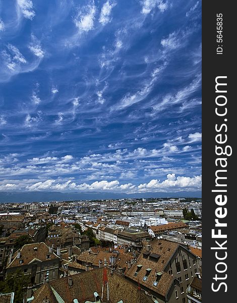 Aerial view of Geneva, Switzerland. Rooftops and a beautifully cloud laced sky. Aerial view of Geneva, Switzerland. Rooftops and a beautifully cloud laced sky.