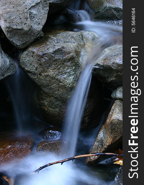 This is a vertical image taken in a stream in Yosemite. This is a vertical image taken in a stream in Yosemite.