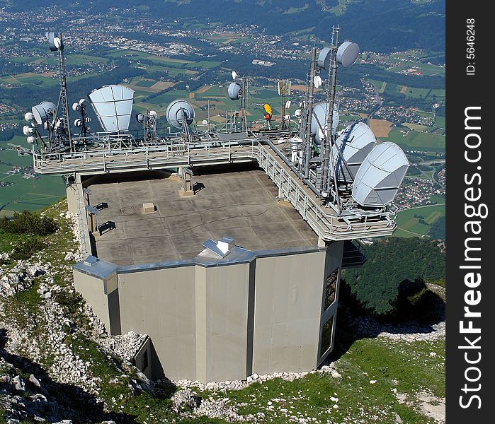 Communication node at the  Untersberg mountain in Austria. 
Small Buildings and green fields at the distance .  Sight from the peak of Untersberg mountain .Not so far from Salzburg . Communication node at the  Untersberg mountain in Austria. 
Small Buildings and green fields at the distance .  Sight from the peak of Untersberg mountain .Not so far from Salzburg .