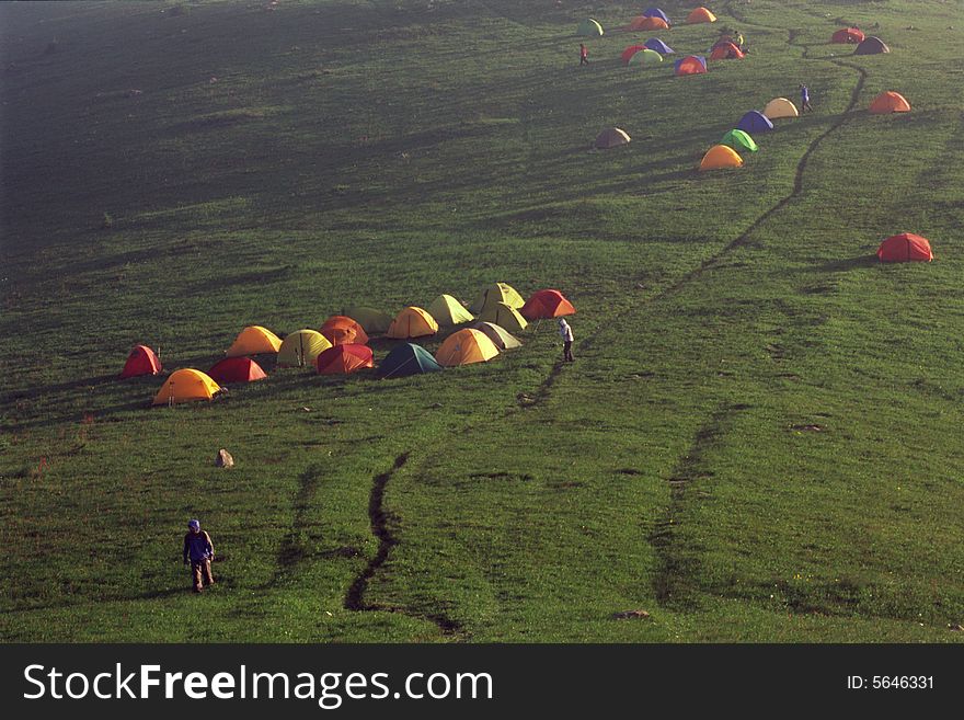 Base camp on the mountain, colorful tents