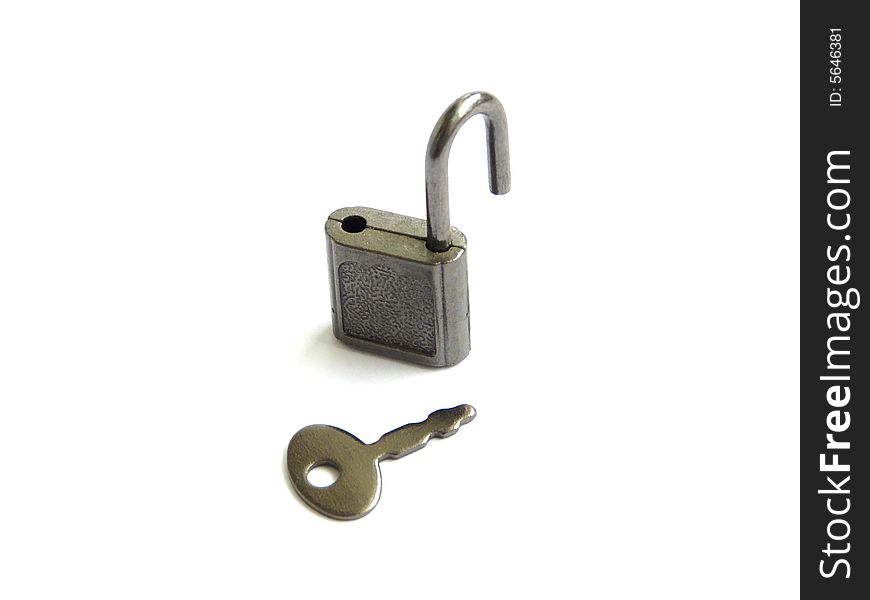 Open lock with key isolated on the white background