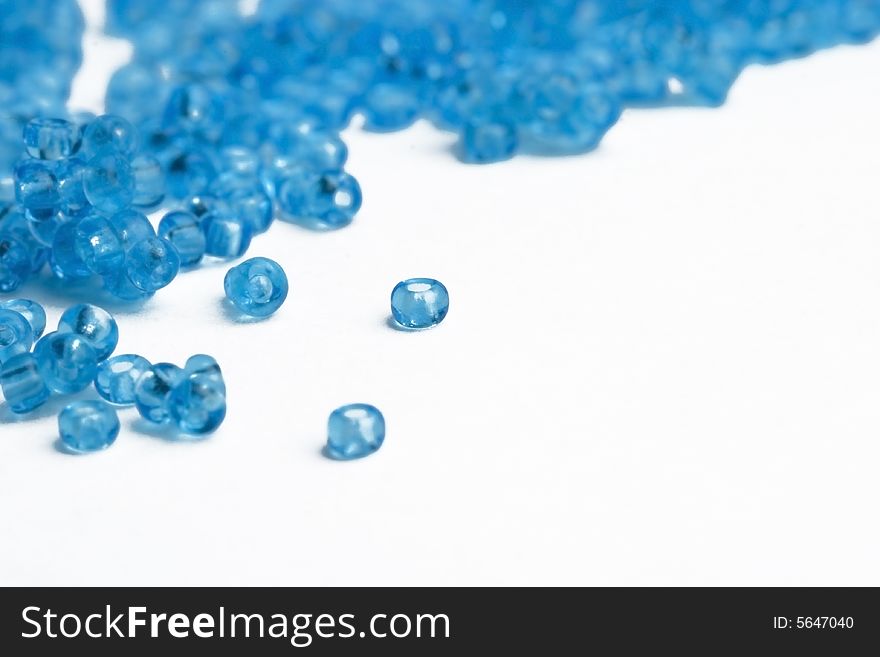 Coral beads blue abstract - white background